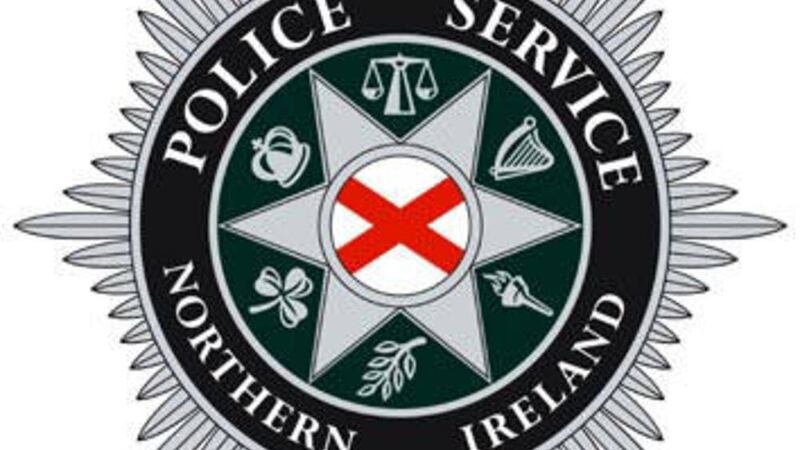 The PSNI has arrested two men in west Belfast after suspected ammunition was found in a house. 