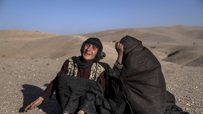 Afghan women mourn relatives killed in the earthquake (Ebrahim Noroozi/AP)