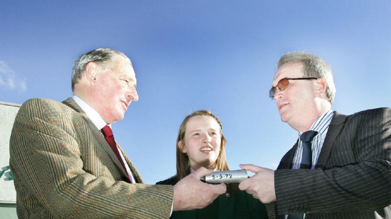 Richard Moore (right) and Charles Inness pictured in 2010 holding the rubber bullet that left Mr Moore blind. The two men were giving a talk at St Mary's school in Limavady&nbsp;