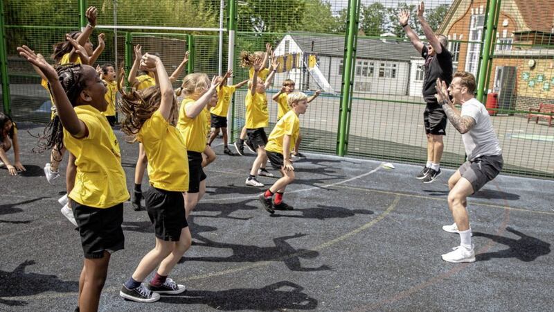 McFly musician and dad of one, Danny Jones, shows primary schoolchildren how to get active using Change4Life&rsquo;s Disney-inspired 10 Minute Shake Up games 