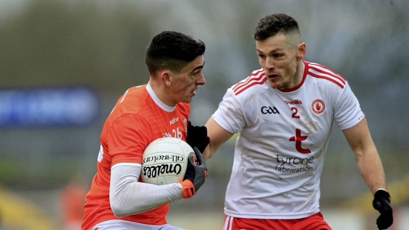 Armagh's Rory Grugan, shown in action against Tyrone's Sean Loughran, came on to score the decisive goal in Saturday's Dr McKenna Cup game at Healy Park.<br /> Picture Seamus Loughran