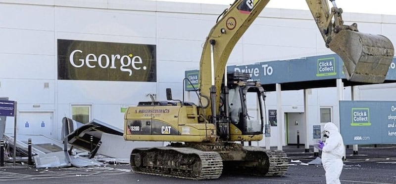 A digger was used to steal two cash machines at the Asda store in Antrim in February. Picture by Arthur Allison, Pacemaker