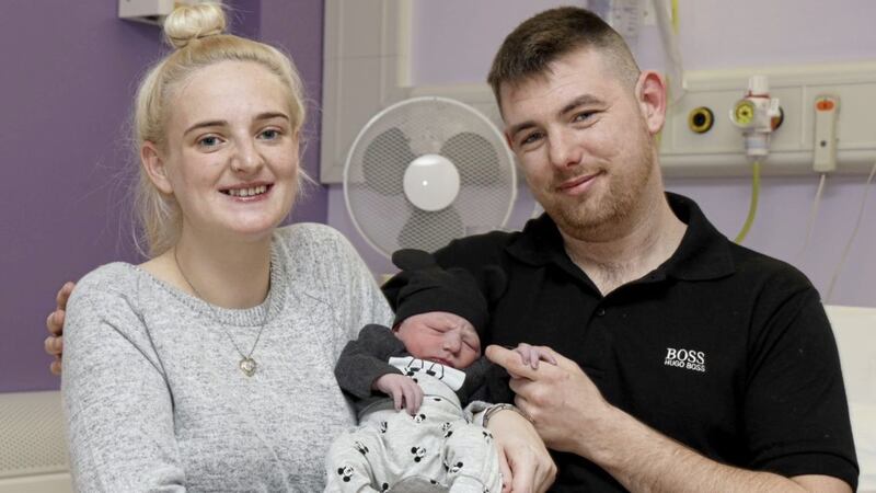 Mum Courtney Moore and dad David Farrell with newborn baby boy. He was born on Christmas Day in the RJMS Active Birth Centre at 08.22am, weighing 6lb 6oz (2890g). Picture by Laura Davison/Pacemaker Press 