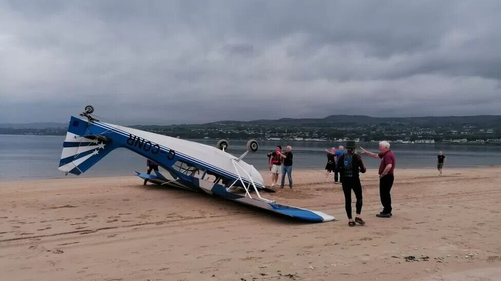 Tony Fitzpatrick and a number of bystanders came to the aid of the pilot after the plane flipped over