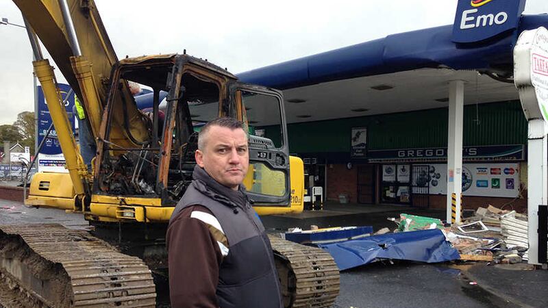 <span style="font-family: Arial, sans-serif; ">Andrew Gregory owner of the garage on the Camlough Road which was targeted in the robbery. Photo: Mal McCann</span>