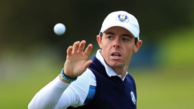 Rory McIlroy (above) still dreams of facing Tiger Woods (below) in the closing stages of a major tournament &nbsp;