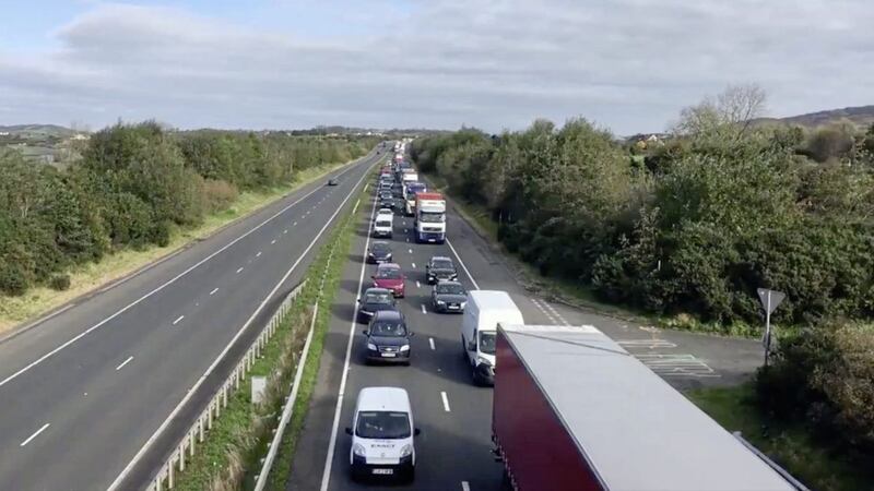 Drivers faced long tailbacks on the main Belfast to Dublin road as gardai started a major high visibility policing operation to coincide with the introduction of highest level of Covid-19 restrictions in the Republic. Picture by BBC NI via Twitter 