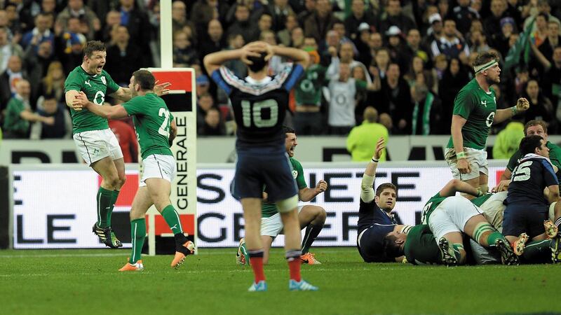 Ireland's Brian O'Driscoll (left) celebrates with team-mate Fergus McFadden on the final whistle at the end of their Six Nations clash with France at the Stade de France, Paris on Saturday March 15, 2014&nbsp;