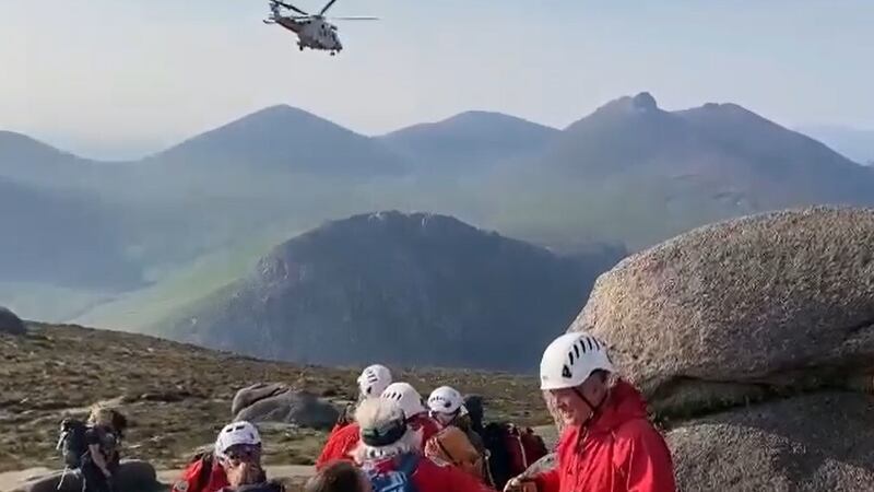 A UK Coastguard helicopter pictured arriving in the Mournes last Friday after a man sustained serious injuries in a fall. 
