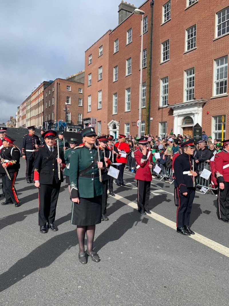 Bands affiliated with the Flute Association of Northern Ireland line up ahead of the start of the parade on Sunday