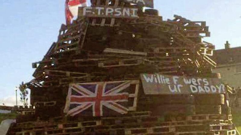 Police are investigating a report of offensive material placed on a bonfire at Carnagat Road in Newry 