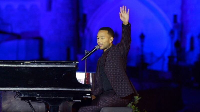 John Legend made a surprise appearance at Disneyland Paris.
