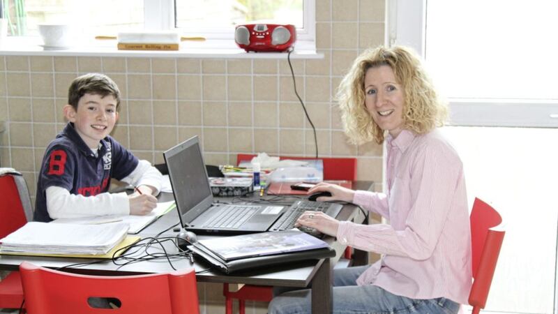 Clare Gallagher of Women in Business NI at home with her 10-year-old son Riley 