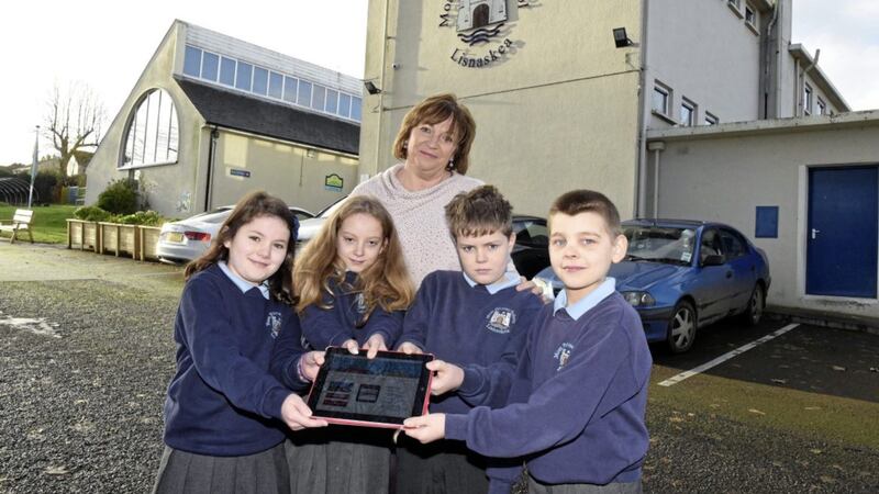 Moat PS principal Felicity Humphreys pictured with Carrie McCourt, Natasha Graham and Lewis Clarke 