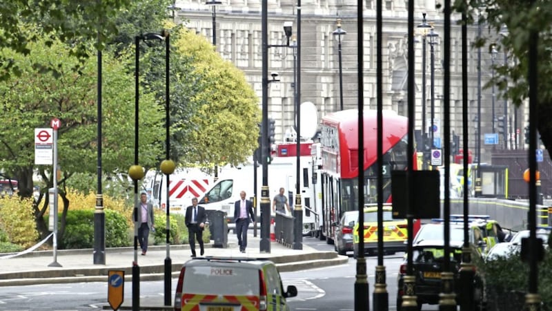 Police activity near the Houses of Parliament in central London after a car crashed into security barriers Picture by Yui Mok/PA 