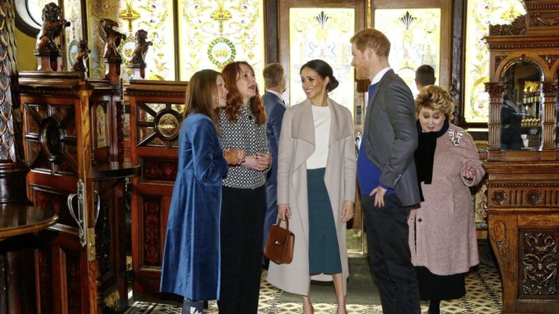 Prince Harry and Meghan Markle visiting the Crown Bar in Belfast in March. Picture by Gareth Fuller, Press Association