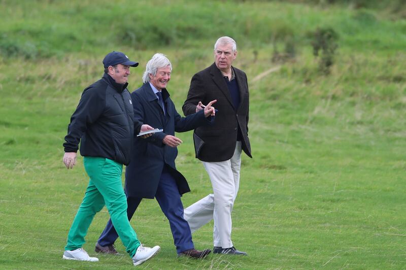 &nbsp;The Duke of York with solicitor Paul Tweed (centre) as he attends The Duke of York Young Champions Trophy at the Royal Portrush Golf Club in County Antrim. Liam McBurney/PA Wire