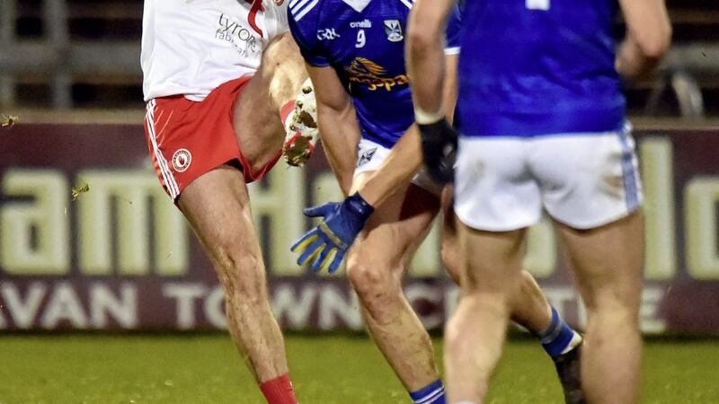 Darren McCurry of Tyrone, shown being challenged by Killian Clarke of Cavan, was one of many Red Hands to misfire in their Dr McKenna Cup opener.<br /> Picture: Oliver McVeigh