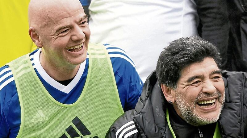 Argentina&#39;s former soccer player Diego Maradona, right, and FIFA President Gianni Infantino, left, share a laugh during a soccer match with FIFA Legends at the home of FIFA in Zurich, Switzerland, last month Picture by AP 