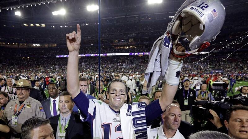 Tom Brady, then of the New England Patriots, celebrates after winning Super Bowl XLIX - he&#39;ll play quarterback for the Tampa Bay Buccaneers in Sunday&#39;s decider. 