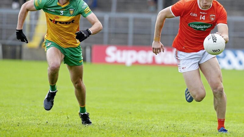 Armagh&#39;s Rian O&#39;Neill and Donegal&#39;s Brendan McCole in action. O&#39;Neill had so many sublime moments and deserves an Irish News Ulster GAA Allstar, says Danny Hughes Picture: Philip Walsh 