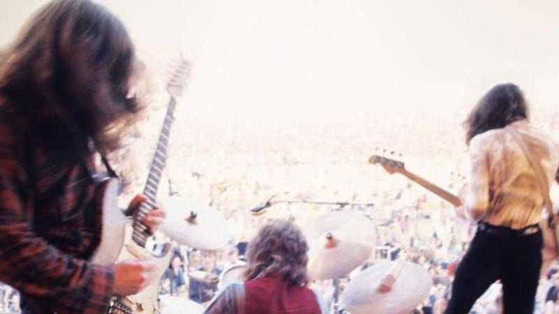 Taste in action with Rory Gallagher (left) 