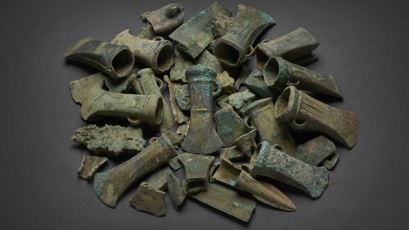 More than 450 bronze objects, including weapons and tools, were unearthed.