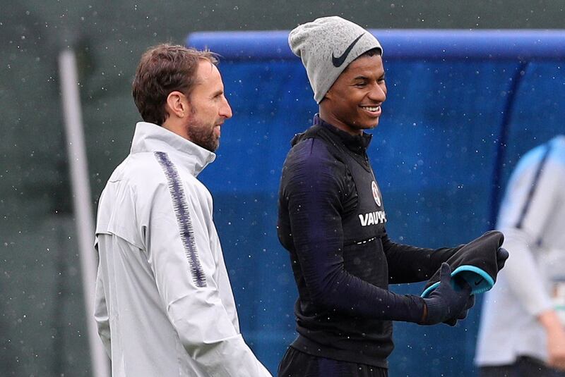 Marcus Rashford, right, and manager Gareth Southgate during the training session at Spartak Zelenogorsk Stadium