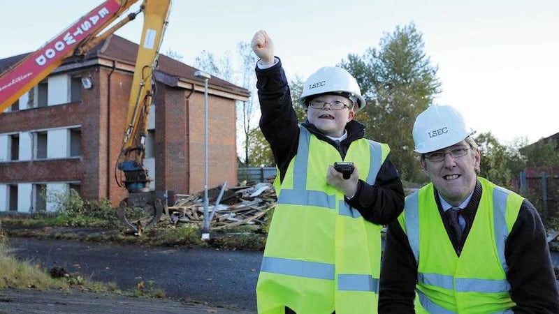 John O&#39;Dowd and Arvalee pupil Conor Canning in 2013 at the start of work on the shared campus 