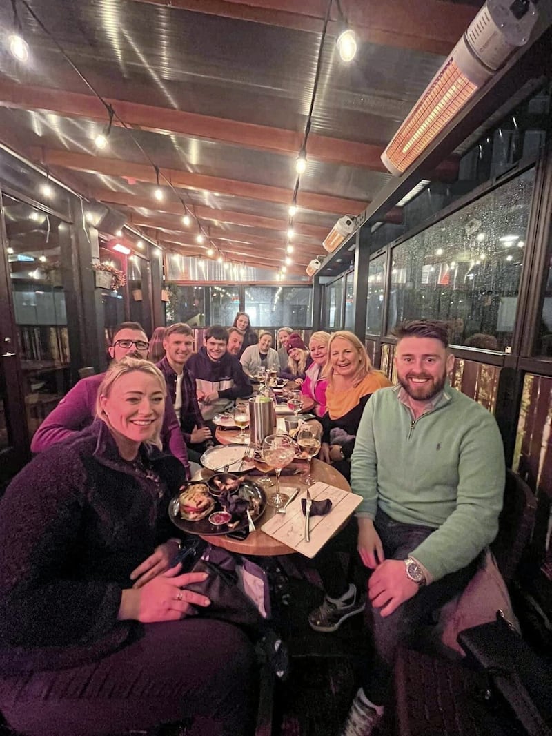 A group from Rory&#39;s Travel Club eating out in Iceland 