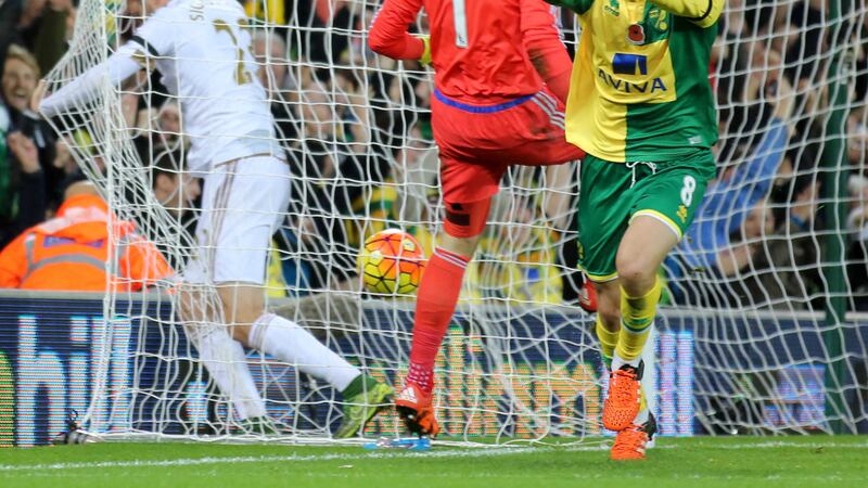 Norwich City's Jonny Howson celebrates scoring the only goal of the game against Swansea at Carrow Road on Saturday<br />Picture: PA&nbsp;