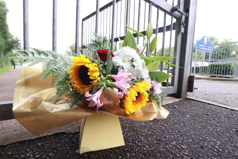 Flowers outside Largy College in Clones after two of it's teenage pupils were killed and three people are in hospital after a crash on Monday. Picture, Liam McBurney/PA Wire