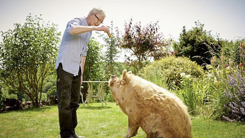 Paul O'Grady with one of his animal friends on his smallholding in Kent, where he has lived for 20 years<br />&nbsp;