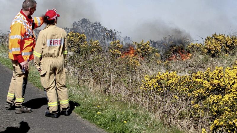 Firefighters battling two large gorse fires in Co Antrim. Picture by McAuley Multimedia  