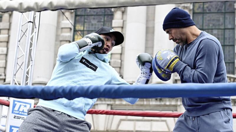 Michael Conlan works out with Adam Booth during the F&eacute;ile Fight Night public workout at Belfast City Hall yesterday. Pic Colm Lenaghan/Pacemaker 