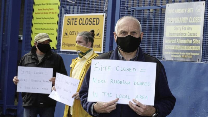 Sean Murray, chairman of Clonard Residents Association, with residents staging a protest outside Springfield Avenue refuse centre which has not reopened since lockdown. Picture by Hugh Russell 