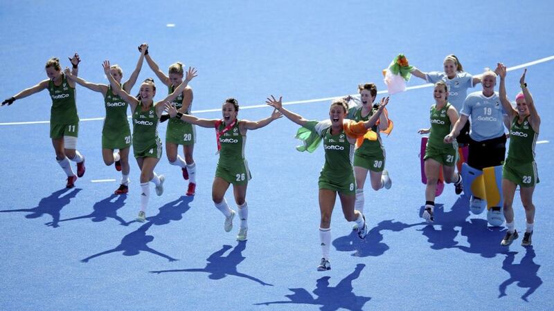 Ireland&#39;s players celebrates after winning a place in the women&#39;s hockey world cup final in London 
