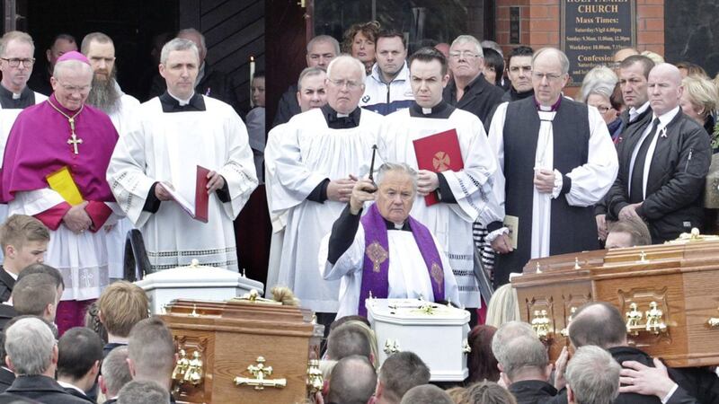 Fr Paddy O&#39;Kane blesses the remains of the five family members killed in the Buncrana pier tragedy. Picture by Margaret McLaughlin 