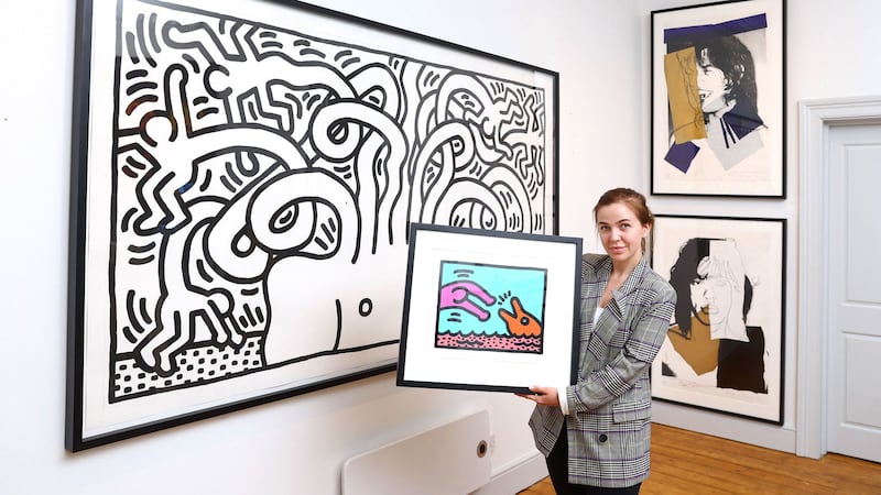 &nbsp;Lana Vinnik with a selection of works by pop artists Andy Warhol and Keith Haring at Gormleys Fine Art in Dublin. Picture by Marc O'Sullivan/PA Wire