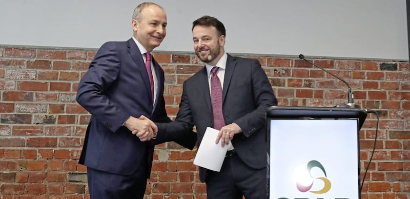 SDLP leader Colum Eastwood and his Fianna F&aacute;il counterpart Miche&aacute;l Martin at the launch of the two parties&#39; partnership in 2019. Picture by Niall Carson/PA Wire  