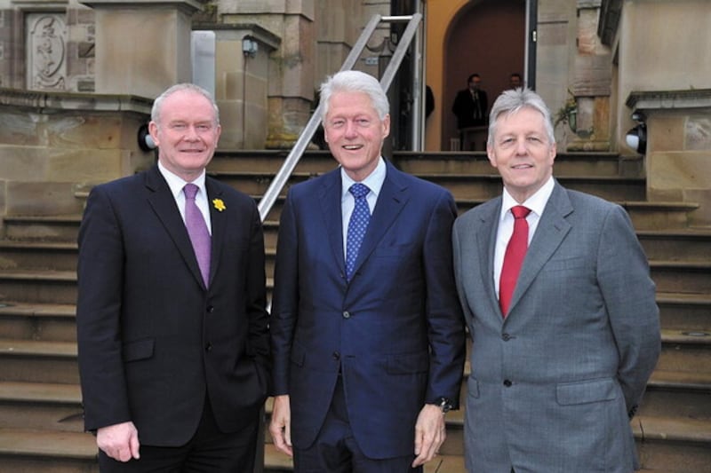  5/3/14: First Minister Peter Robinson and Deputy First Minister Martin McGuinness meet with former US President Bill Clinton at Stormont Castle, Belfast. Picture: Michael Cooper