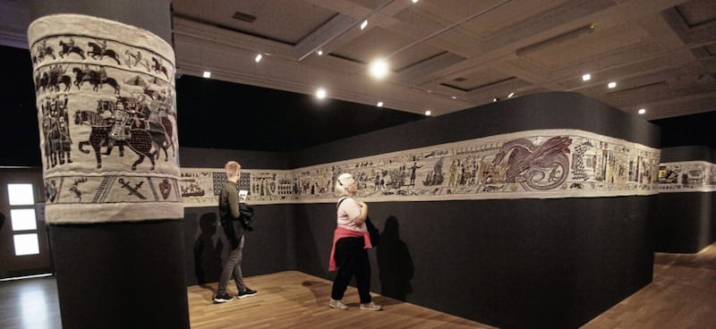 Visitors view the Game Of Thrones Tapestry, which is being worked on by a group of 30 women in Belfast Picture: Ann McManus 