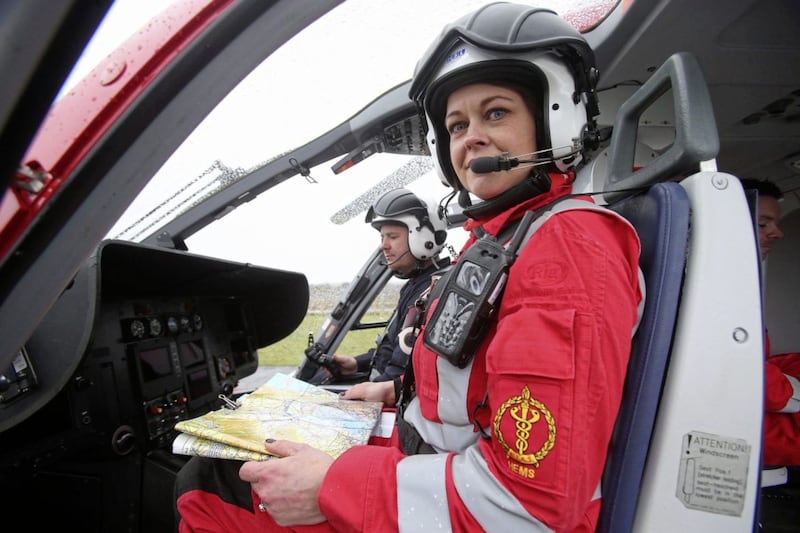 Air ambulance paramedic Emma Boylan from Armagh and pilot Richard Steele from Ballinderry at the AANI base at the former Maze prison site Picture: Mal McCann 