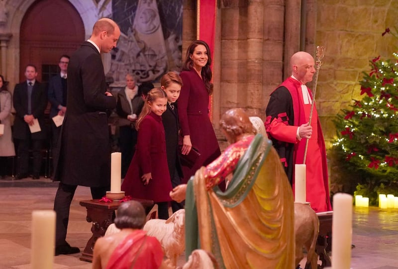 The Prince and Princess of Wales arriving with their children Princess Charlotte and Prince George arriving for the Together at Christmas Carol Service at Westminster Abbey in London