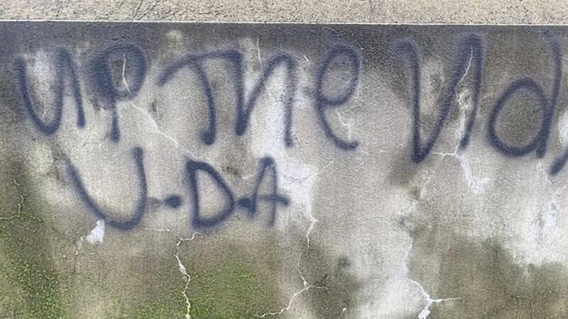 Pro-UDA slogans were daubed on the walls of Clann na Banna GAA club.  