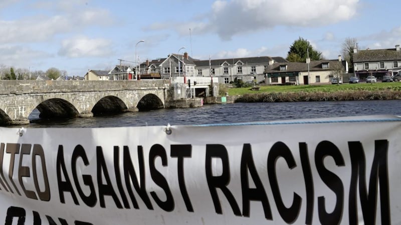 Banner on display at an anti-racism rally titled &#39;Love Rooskey: No to Racism: Asylum Seekers Welcome&#39; in Rooskey, Ireland. Picture by: Niall Carson/PA 