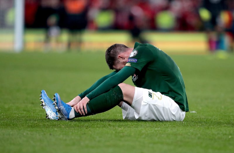 A dejected Matt Doherty after a disappointing result for the Republic of Ireland