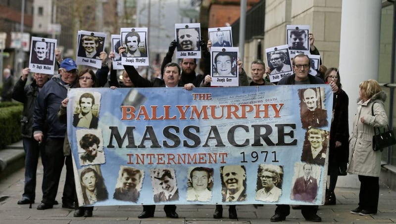 John Teggart (front centre), whose father Danny was shot dead at Ballymurphy in 1971, stands with fellow campaigners outside Laganside courts in Belfast. Picture by Niall Carson, Press Association 