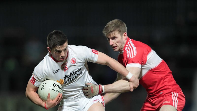 <span style="font-family: Arial, sans-serif; ">Tyrone's Ronan O'Neill and Derry's Niall Holly tussle during the National League clash between the counties at the start of March Picture by Margaret McLaughlin</span>&nbsp;