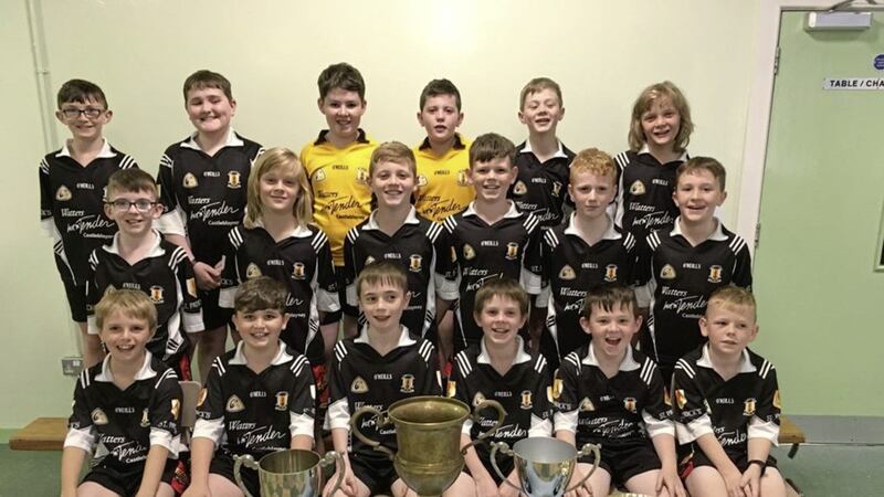 Pupils from St Patrick&rsquo;s primary school, Cullyhanna with the cups they won in the various football competitions organised by Cumann na mBunscol Ard Macha in 2019. The boys were the five-a-side Indoor County champions, the winners of the Malachy McGeeney Cup in the seven-a-side competition for medium-sized primary schools; the winners of the McGreevy Cup in the 11-a-side Championship and winners of the Edmund Murray Cup 